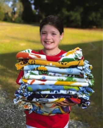 Alexis Blasky and her friends from Florida made these blankets to share love to flood victims in San Saba, Texas.