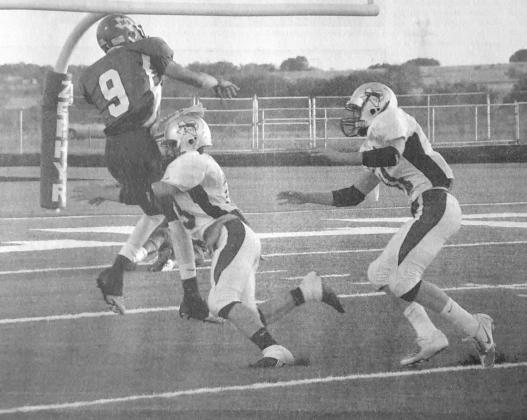 10 Years Ago: September 3, 2010 - #2 Richland Springs defeats # 8 Milford 58-56 in Season Opener - Chance Bush #3 and Ben VanCleave #11 converge on the Milford quarterback.