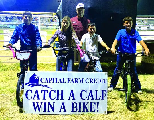 Capital Farm Credit Calf Scramble winners- Friday night Left to right- Gavin Jolly, Macy Meador, Brian Rocha, and Sloan Sanderson Courtesy of Cindy Stewardson