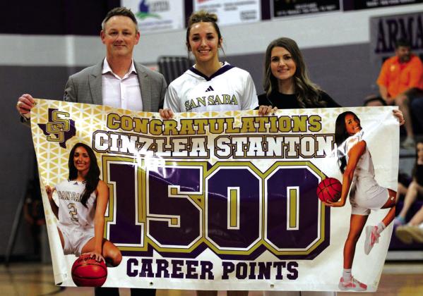 Cinzlea Stanton along with Coach Robert Gray and assistant coach Marki Kinkade