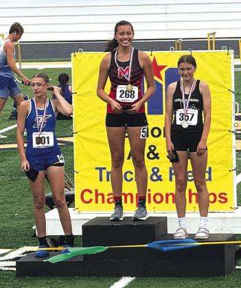 Emma Bryant (on the right hand side) receiving her 2nd place medal...  She is now moving on to State!