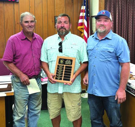 Mike Teel (center) was honored as the Employee of the Month for June 2026 during the June 9th City Council meeting. Mike works in the Parks Department. He was awarded a dedicated plaque with his name on it as well as a gift certificate to a local restaurant. Taking part in the presentation were Alderman Robert Whitten (left) and Mike’s supervisor, Chris Stewart (right). Courtesy of Scott Glaze