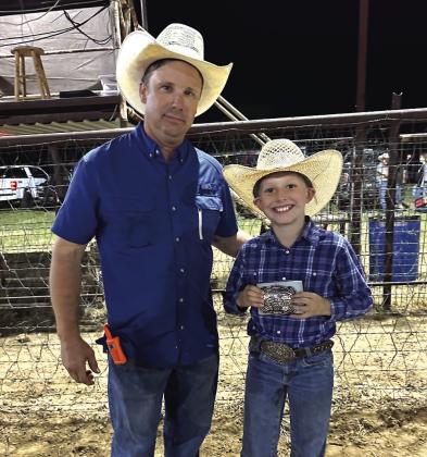 Junior All-Around Cowboy is Mack Troyer. Awarding his buckle was director Wes Bryant.