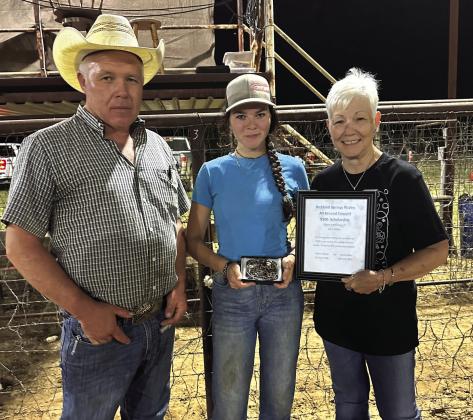 HS All-Around Cowgirl is Bentley Till. She was awarded a $500 scholarship by director Paula Miller and son Clayton.