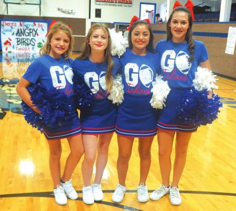 Junior High cheerleaders at their first pep rally of the year: Lily Graves, Tilar Turman, Lauren Roberson and Payton Hanley.