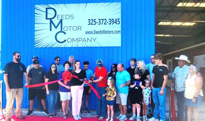 Ribbon Cutting Ceremony for Deeds Motor Company new location. Small photo: Ramon Aguilar was happy to receive the $1,000 cash drawing winnings from Billy Deeds!