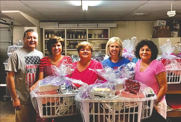 Shown helping wrap and load baskets for the Senior Basket Project are: Silvestre Barco, Dora Miller, Donna Shahan, Colleen Womack and Rose Mary Cisneroz. Not pictured were Shana Paddie and Callie Nelms.