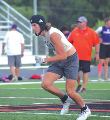 San Saba High School varsity football senior tight end Dylan Ware begins to run a route on Wednesday, June 15th, during a Dillos 7-on-7 summer scrimmage held at Llano High School.