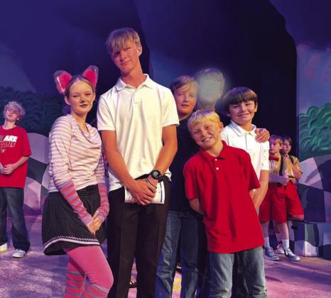 Some of the kids got to pose with members of the cast of Alice in Wonderland Jr.