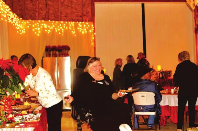 This picture of Trish Fullerton is really cute, and this was one of her first outings since breaking her femur at a district Garden Club meeting a couple of months ago.