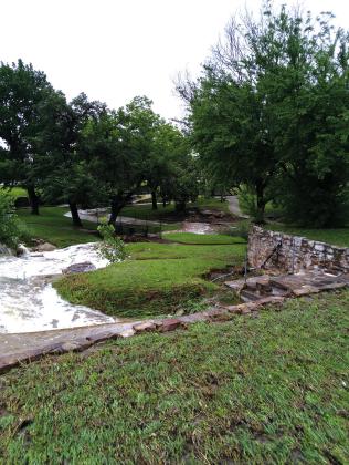 Mill Pond Park had EXTRA water falls with the floodwaters that flowed through the pond from town. Courtesy of Carolyn Boswell Preece