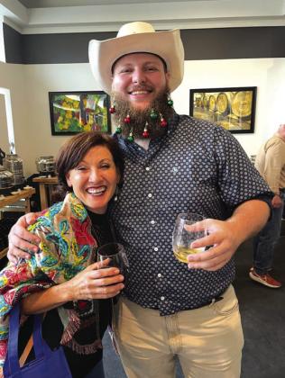 Catherine Hanrahan and Grant Kinscherff (of Austin) at Sip N' Stroll last Saturday. Mr. Kinscherff hunts here and brought his whole family to San Saba for the Sip N' Stroll. This picture was taken at San Saba Olive Oil Company. Picture submitted by a community member