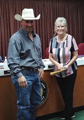 San Saba Justice of the Peace Sharon Blossmen swore in the incoming Chief of Police Stephen Lozano at the City Council meeting last week on July 8, 2025. The meeting was very well attended with standing room only. After the swearing in, a small reception for Chief Lozano was held. Photo by Djuana Payton