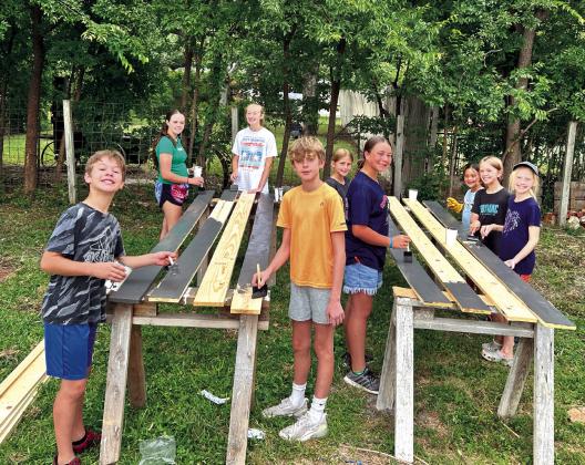 Volunteers of all ages carved out time to help out with Mission San Saba to bless a family. Photo courtesy of Corina Fauley
