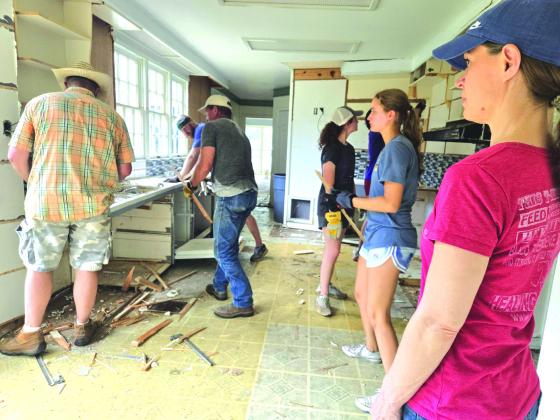 It’s kitchen demolition time!  Photo courtesy of Corina Fauley