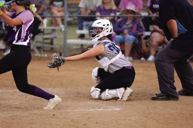 #00 Catcher Brooklyn Carrington alert and ready as the Mason batter is at the plate
