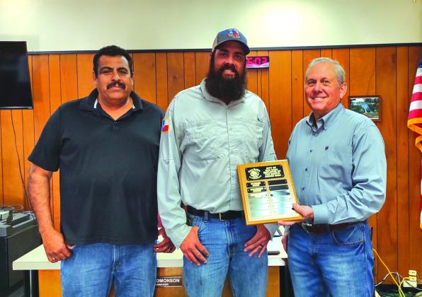 Brandon Verette, Street Department Employee, was awarded Employee of the Month for March of 2024. Taking part in the ceremony were Brandon's supervisor Luis Rios (on his right) and Mayor Ken Jordon (on his left).