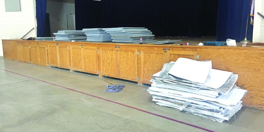 You can see the difference in the old  insulation (on the floor) and the new insulation (on the stage). Photo courtesy of Scott Glaze