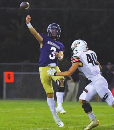 San Saba High School varsity football junior quarterback, Lance Taylor (3), throws the ball downfield.