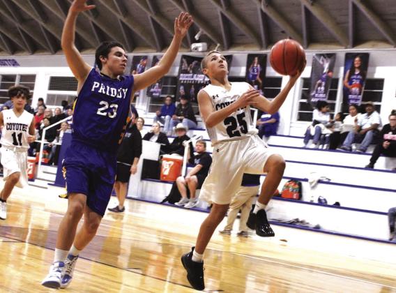 Trendon Vobel (#25) makes a layup in the win against Priddy.