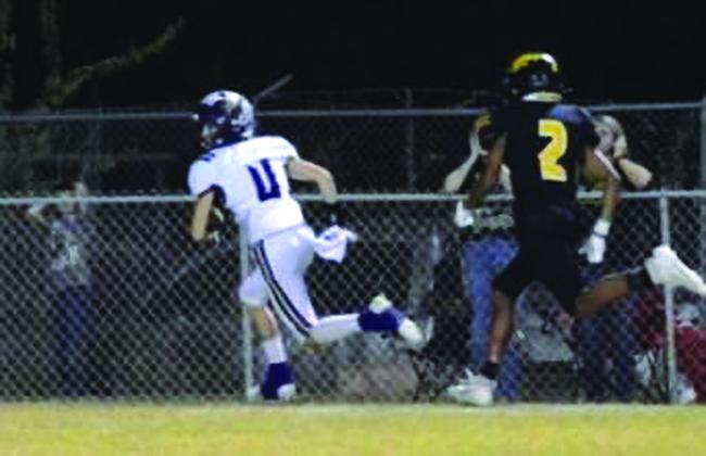 Skylar Romero takes off to the endzone for the game-winning score! Courtesy of Rita Boultinghouse