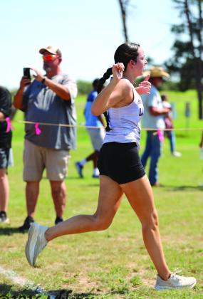Raylee Wood crossing the finish line last Wednesday