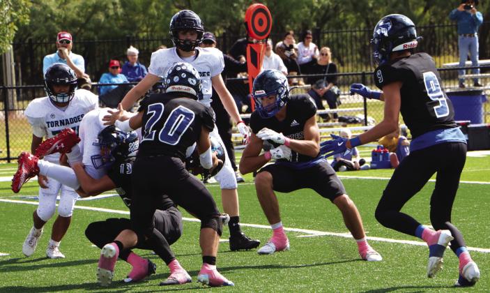 Gage Behrens (#20), Hutton Rogers (#9), Cohen Ethridge (#13), and #1 Jim Eckermann (#1) Courtesy of Pam Starr