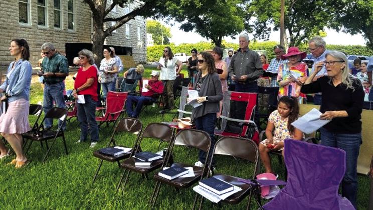 Here is a good portion of the congregation gathered in attendance at last Sunday's outdoor worship service. Courtesy of Jacqueline Carlson