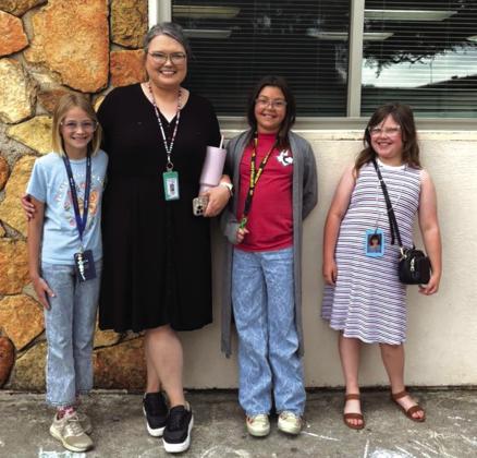 Dress Like Your Teacher Day (Mrs. Wilson): Georgia Broyles, Mrs. Wilson, Brylee Watson, and Avery Wilson Courtesy of Kari Owen