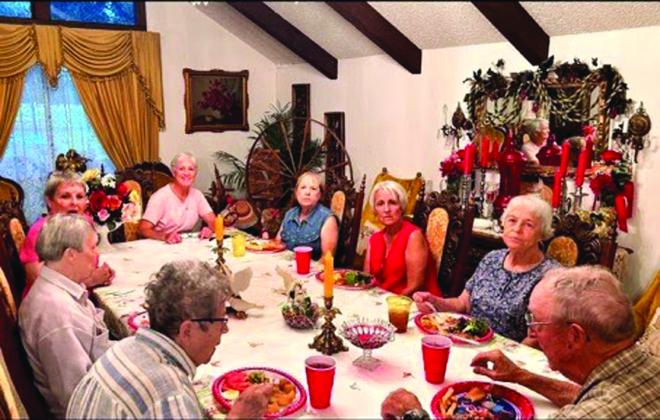 William Clark's 86th birthday celebration. Left to right: Jane Clark, Nancy (Clark) Hicks, Carrie (Clark) Keeney, Toni (Clark) Mayben, CheeChee (Clark) Brockman, Penny Clark, Patsy (Clark) Henniger, William Clark. Photo by Carrie Keeney