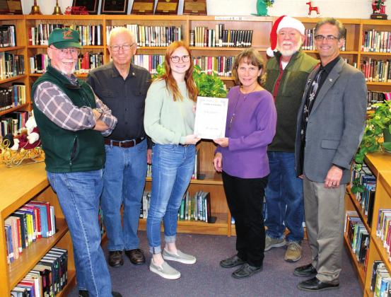 Pictured left to right are: Rotarians Bill Phillpotts, Jerry Blankenship, Jaela Nelson, Jacqueline Carlson, and Mike Thomas, along with HS Principal, Scott Snyder.