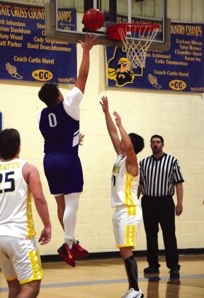 Uriah Valdez playing big under the basket against Priddy last week. Courtesy of Valerie Valdez