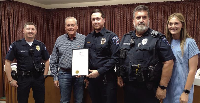 Proclamation recognizing May 11th - 17th as National Police Week. Mayor Ken Jordan read the proclamation he signed and presented it to these representatives of the San Saba Police Department. Pictured left to right: Officer Mann, Mayor Jordan, Officer Boivin, Officer Batchelor, and Admin Clerk Courtney Grady. Photo by Djuana Payton
