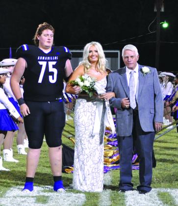 Senior Lexy Amthor is the daughter of Carey Lebow and Mickey Westerman. She is escorted by her grandfather, George Amthor. Flower presenter is Daylon Smith, son of Danna and Joe Pete Smith.