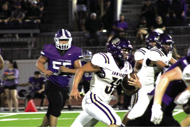 San Saba’s #32 Alex Estrada carries the ball in the win over the Buffaloes last Friday night. Photo by Jared Holder