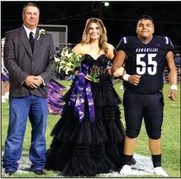 Senior Nominee Macy Sebastain, daughter of Tim and Mindy Sebastain, escorted by her father, Tim Sebastain. Flower presenter: Jesus Gonzalez, son of Jesse Gonzalez and Maria Olavarria.