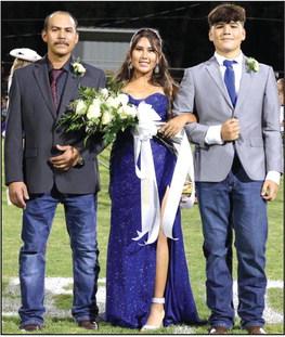 FRESHMAN DUCHESS - Ximena Cuevas, daughter of Ivan and Rosaura Cuevas, escorted by her father Ivan. Flower presenter: Jose Vega, son of Manuel Vega and Maria Macias.
