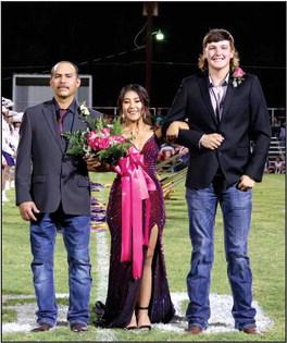 Senior Nominee Natalie Cuevas, daughter of Ivan &amp;amp; Rosaura Cuevas, escorted by her father, Ivan. Flower presenter: Cooper Owen, son of Will and Shele Owen