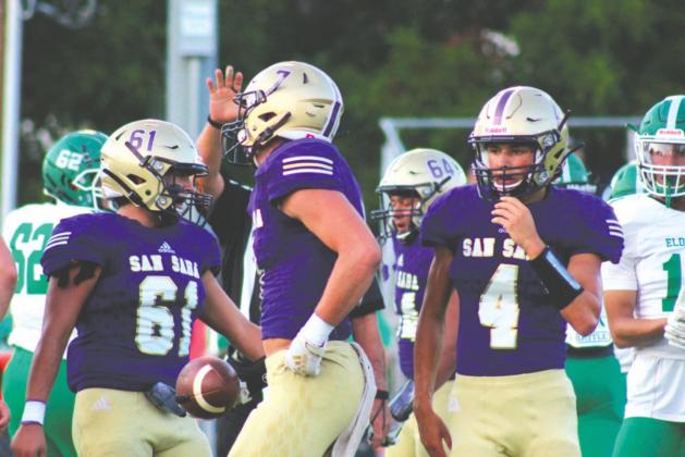 Bladen Calley #61, Stone Sears #7 and Reagan Mejia #4 join in the Dillo victory celebration.
