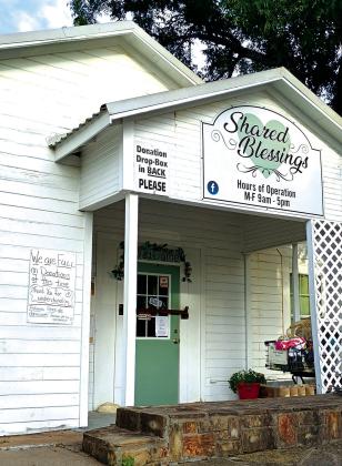This photo was taken at Shared Blessings last Thursday, July 17th. The note to the left of the door says, “Full on donations at this time. Thank you for understanding. Photo by Djuana Payton