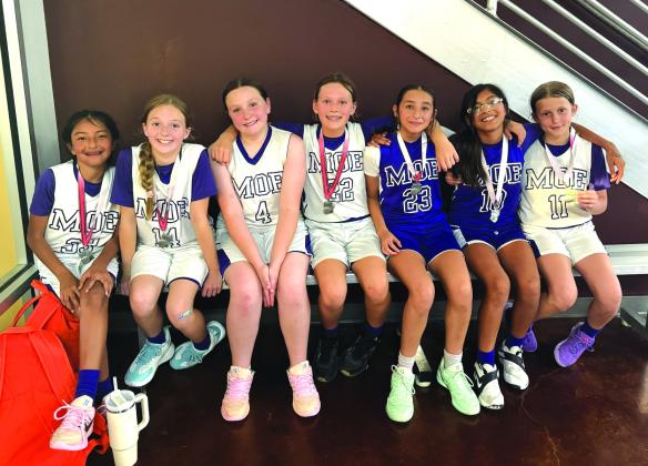 MOE 5/6 places second at “Not on Mother’s Day Shootout.” Pictured L-R are: Abigail Davila, Myers Wallace, Albany Dudley, Summer Stanton, Victoria Davis, Aliah Davila, and Emma Kate Kuehl.