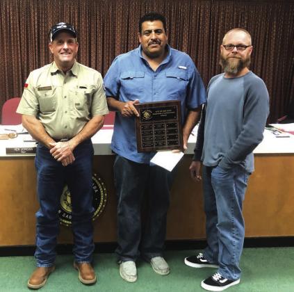 Luis Rios, Street Department Supervisor, was awarded the Supervisor of the 4th Quarter. Taking part in the presentation were Scott Glaze, Public Works Director (to Luis' right) and Alderman Michael Nelson (to Luis' left). Luis received a gift certificate to a local restaurant, and his name was ingraved on a designated Supervisor of the Quarter plaque. Congrats, Luis! Photo by Scott Edmonson