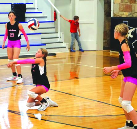 Macy Mask (#23), Grace Youngreen (#7) (floor), Kaylee Salas (#15)