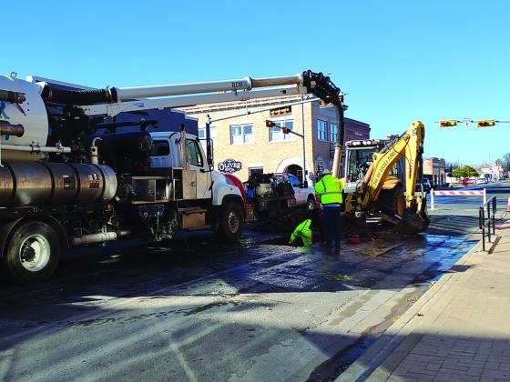 City workers were hard at work Thursday morning at 8 a.m. fixing a water leak on Wallace Street in front of Harry's. Wallace Street was closed to traffic during the repair. Staff Photo