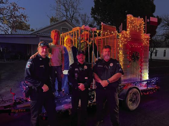 3rd Place: San Saba Police Department- Blue Santa Arrested Buddy the Elf