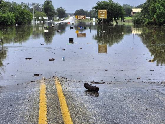 This was on East Wallace Street in front of the under water Mill Pond Park entrance on the morning of July 5th. The water level was even higher than this before it started to recede. Courtesy County Judge Jody Fauley