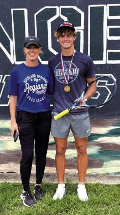 Coach Eckert and Layne Ward. Lane advances to state level. Courtesy of Pam Starr