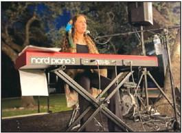 Presley Grace, 17-yr-old singer/performer from Austin, providing entertainment  Photo submitted by Christa Martin