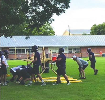 The O-line working on staying low