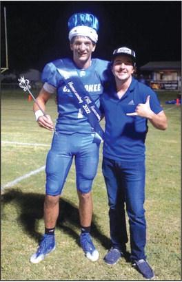 Cherokee - 2022 Homecoming King, Rode Ligon, with former king, Isaac Graves See Back Page for more Homecoming pictures.